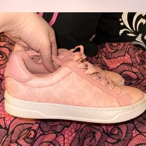 SOLD
Coach pink signature canvas shoes! 
Size 7